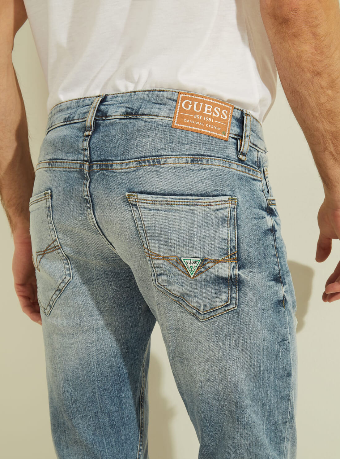 GUESS Mens Eco Low-Rise Skinny Fit Miami Denim Jeans in Badwater Blue Wash M1GAN1D4B13 Model Back Detail View