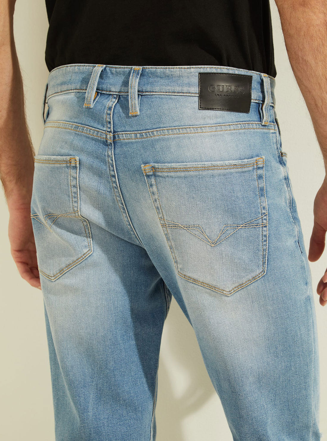 GUESS Mens Low-Rise Slim Tapered Denim Jean in Jackson Wash MB1AS2303D1 Detail view