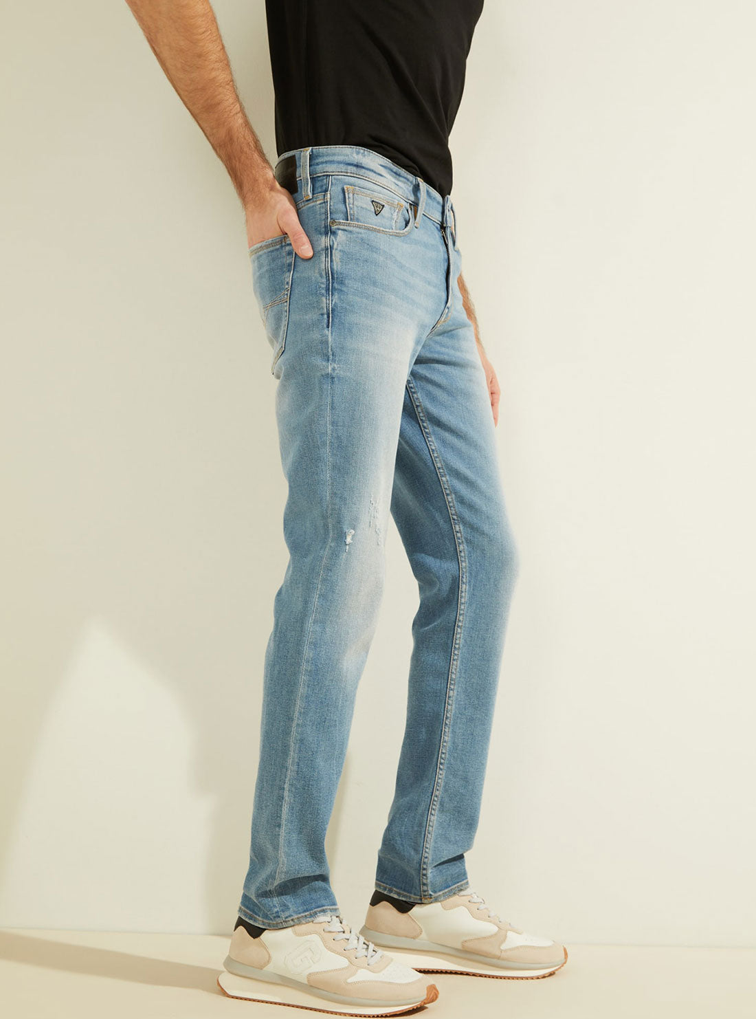 GUESS Mens Low-Rise Slim Tapered Denim Jean in Jackson Wash MB1AS2303D1 Side view