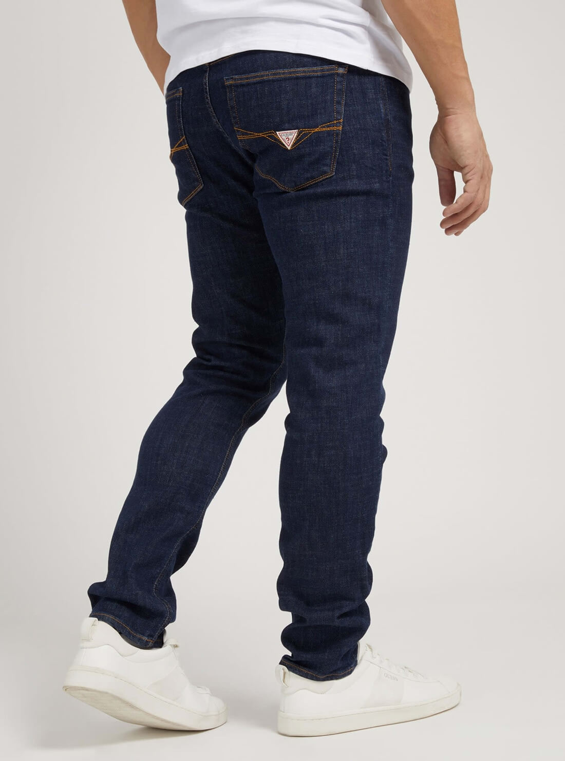 GUESS Mens Mid-Rise Slim Fit Tapered Leg Denim Jeans in Dakota Wash M2RAS2D4G22 Model Back View