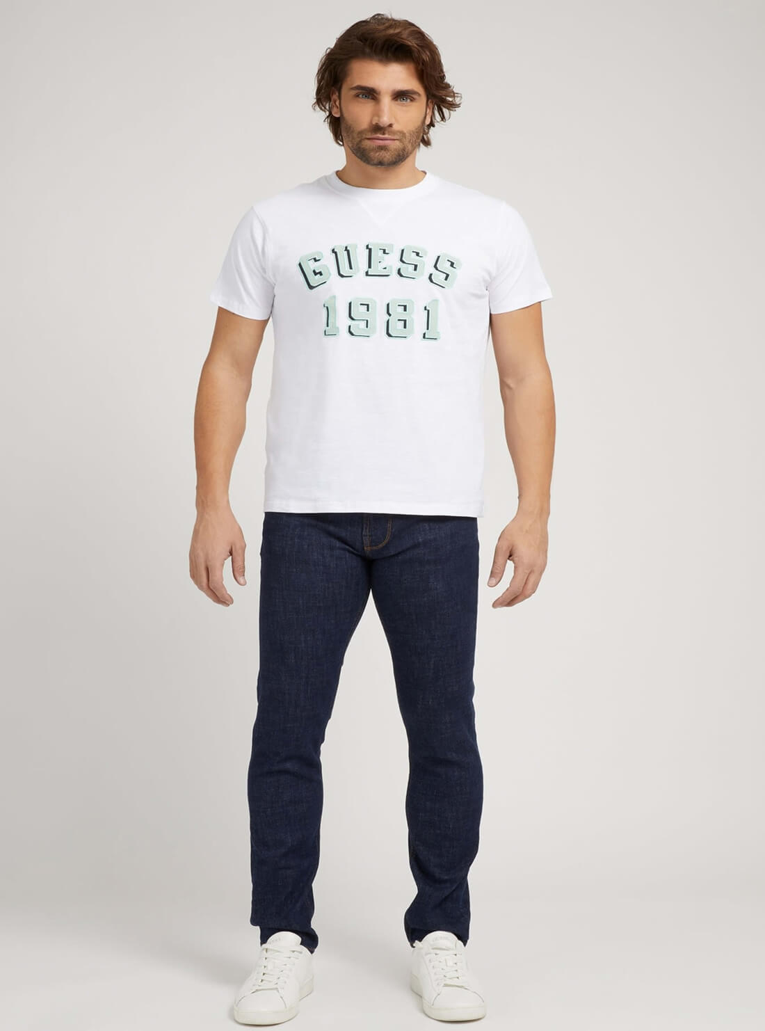 GUESS Mens Mid-Rise Slim Fit Tapered Leg Denim Jeans in Dakota Wash M2RAS2D4G22 Model Full View