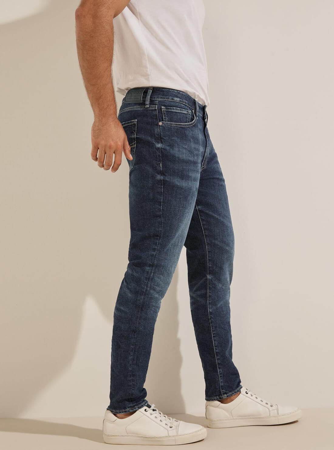 GUESS Mens Mid Rise Slim Straight Leg Drake Denim Jeans in Samurai Wash M2RA37D4EX5 Model Side View