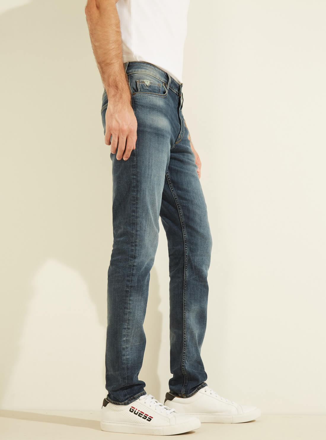 GUESS Mens Mid-Rise Slim Tapered Denim Jeans in Classic Wash MBYAS2R44D0 Side View