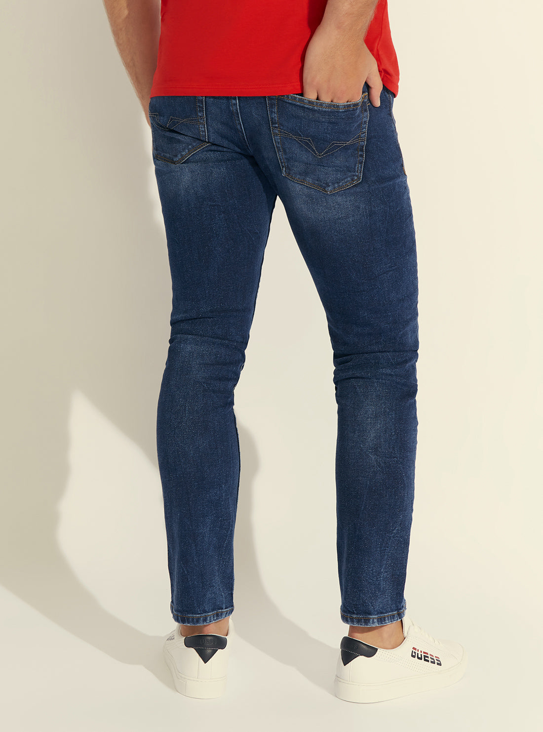 GUESS Mid-Rise Slim Tapered Womens Denim Jeans in Off Water Wash MB0AS230461 back view