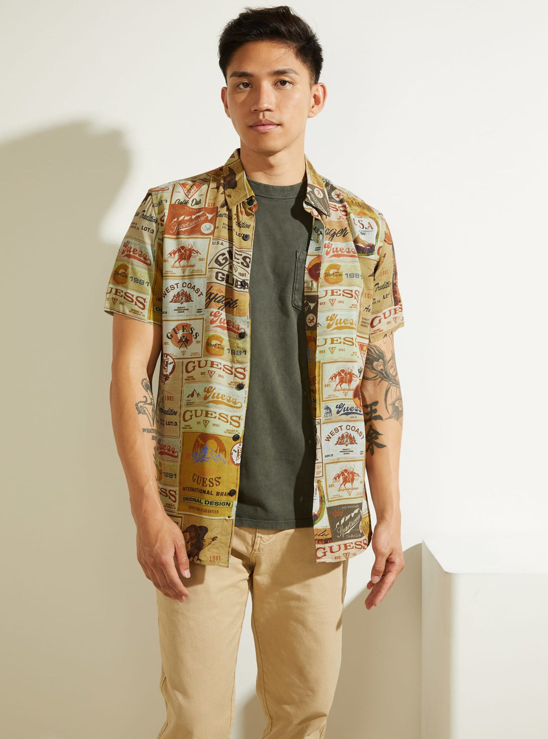GUESS Mens Eco Pop Art Print Vintage Poster Shirt M1BH06WD4Z0 Model Front View