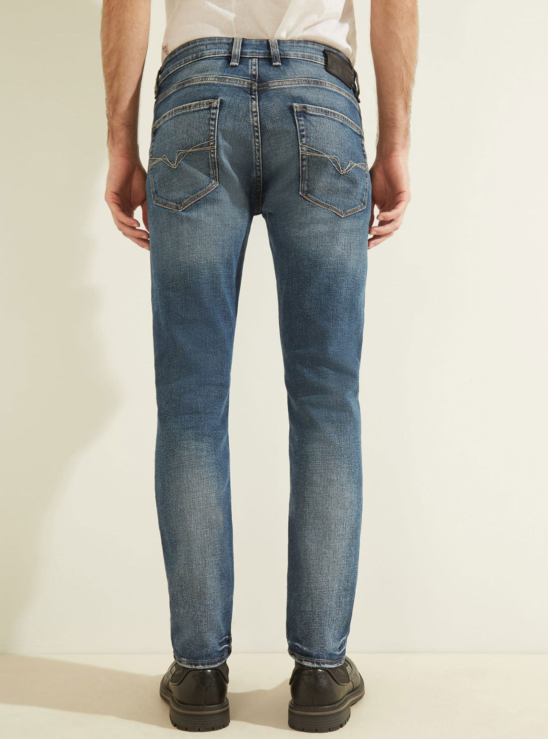 GUESS Mens Low-Rise Slim Straight Denim Jeans in Stratus Blue Wash MBGAS13041B Full View