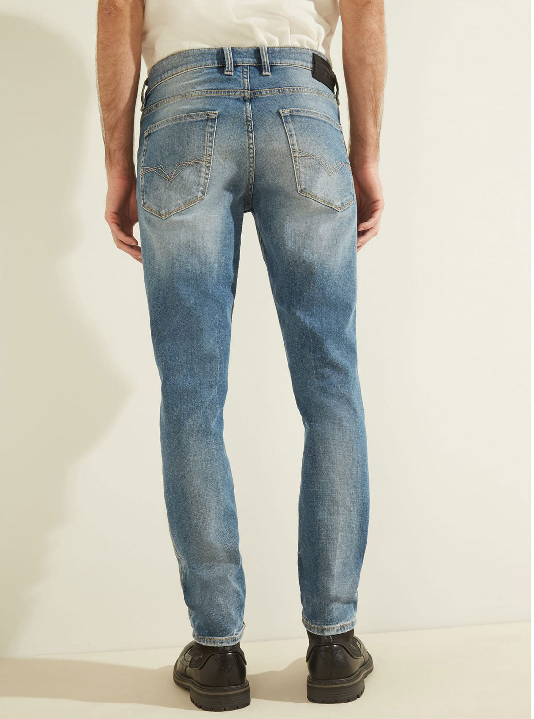 GUESS Mens Mid-Rise Slim Tapered Denim Jean in Light Tide Wash    MBGAS23041B Back View