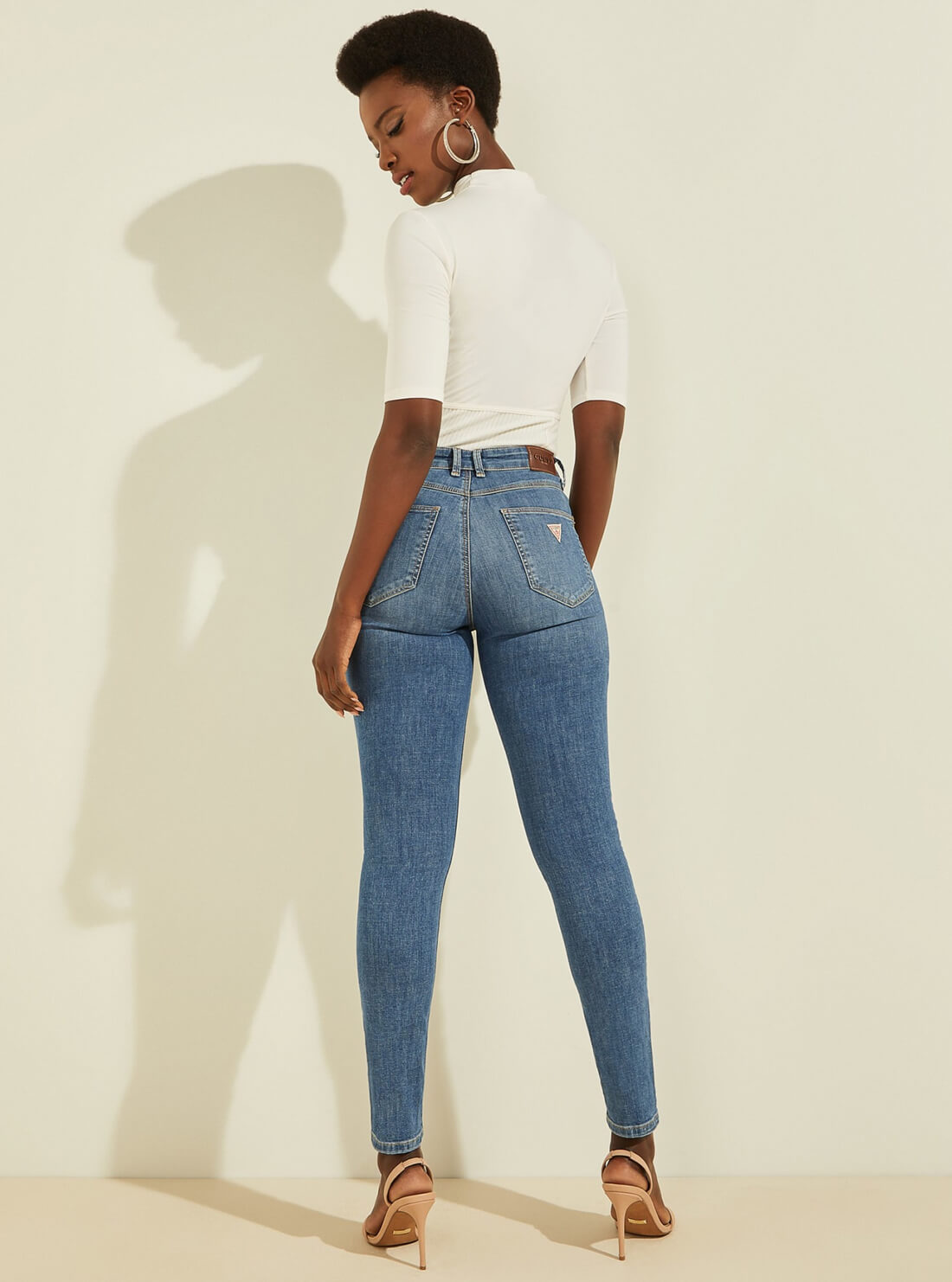GUESS Womens 1981 High-Rise Skinny Denim Jeans in Blue Drum Wash W1BA28D4HG3 Model Back View