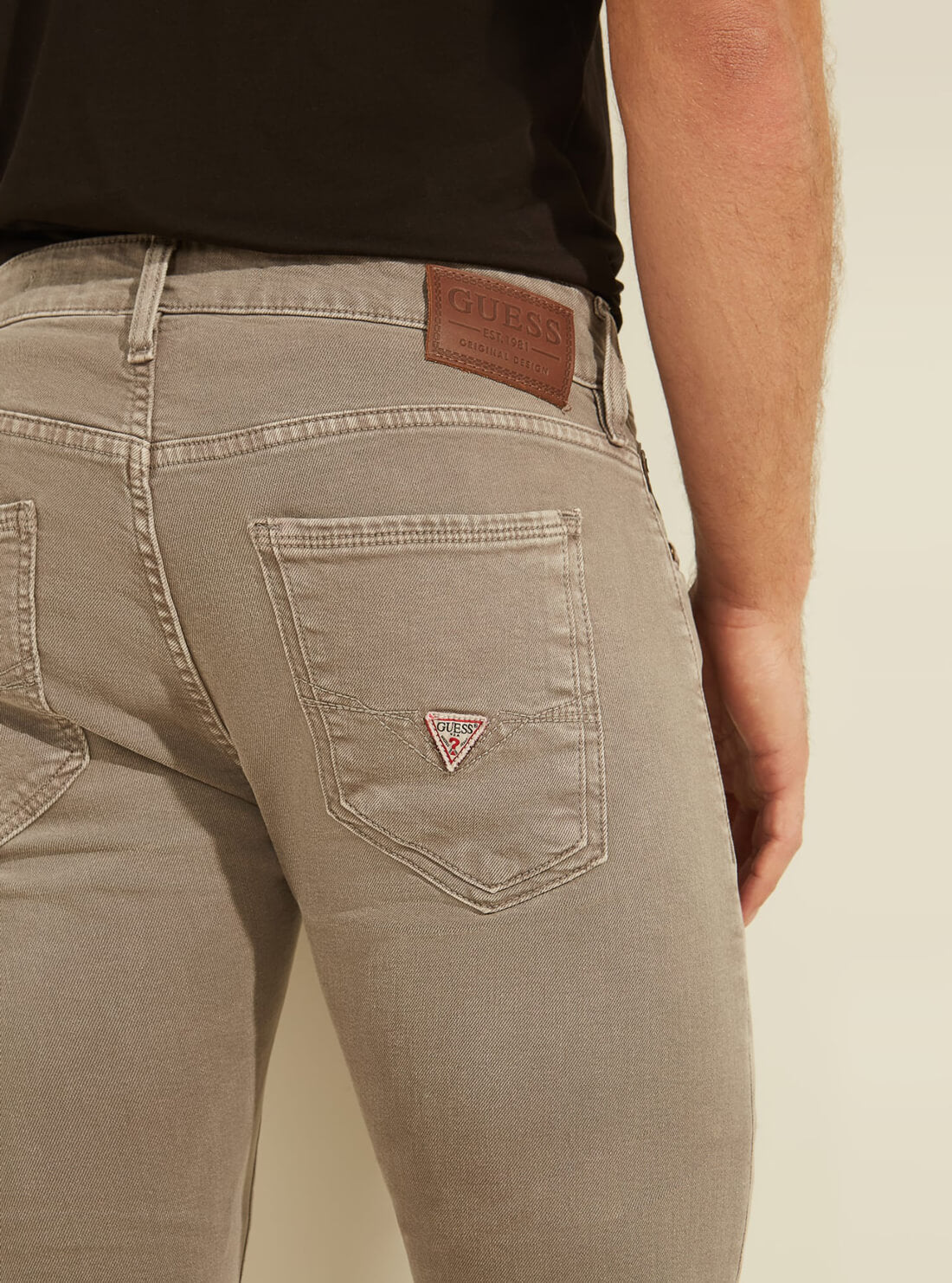 GUESS Mens Low-Rise Dyed Skinny Denim Jeans in Light Brown Khaki M1YAN3R34V0 Detail View