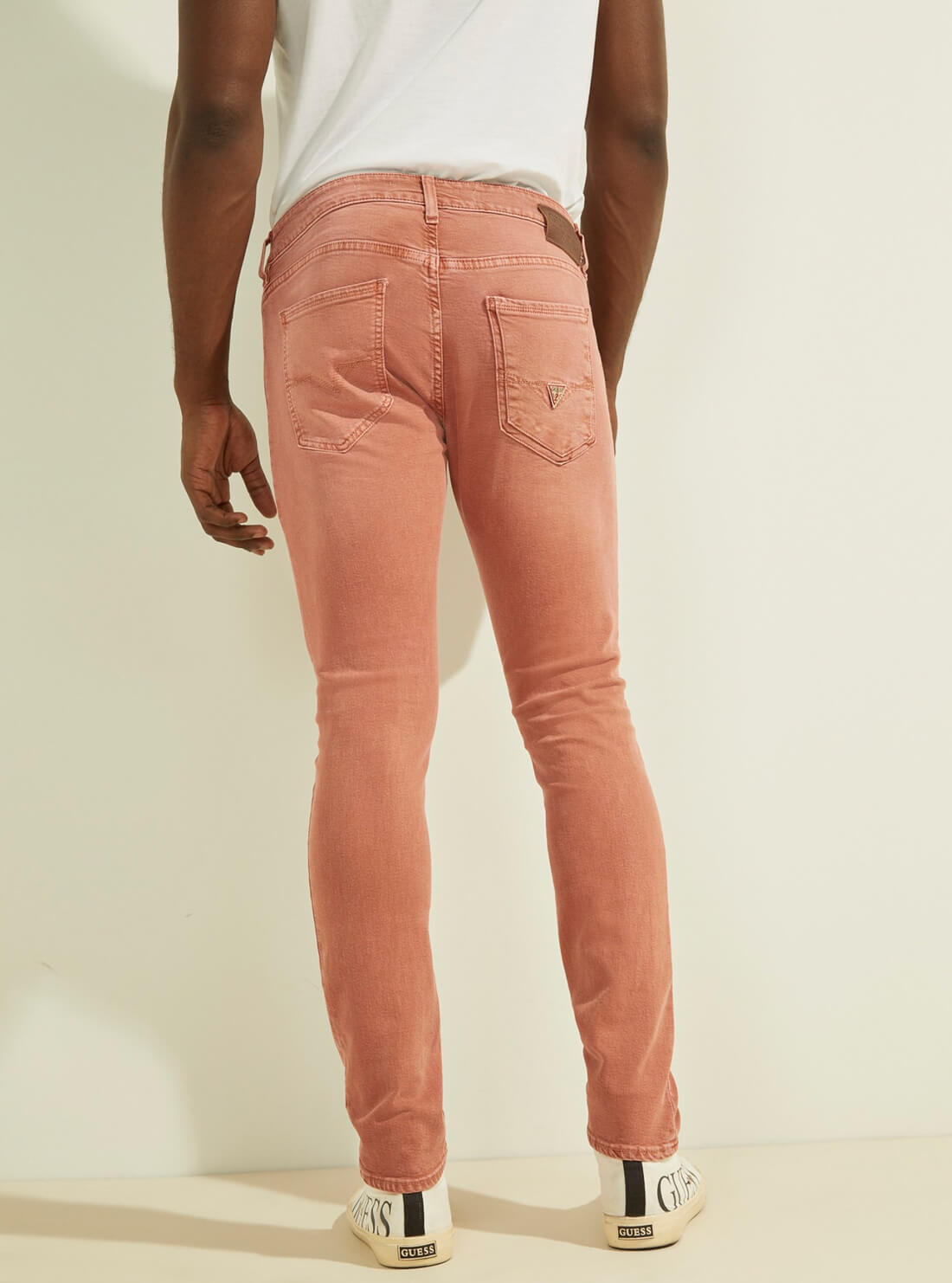 GUESS Low-Rise Dyed Skinny Denim Jeans in Summer Spice Orange M1YAN3R34V0 Back View