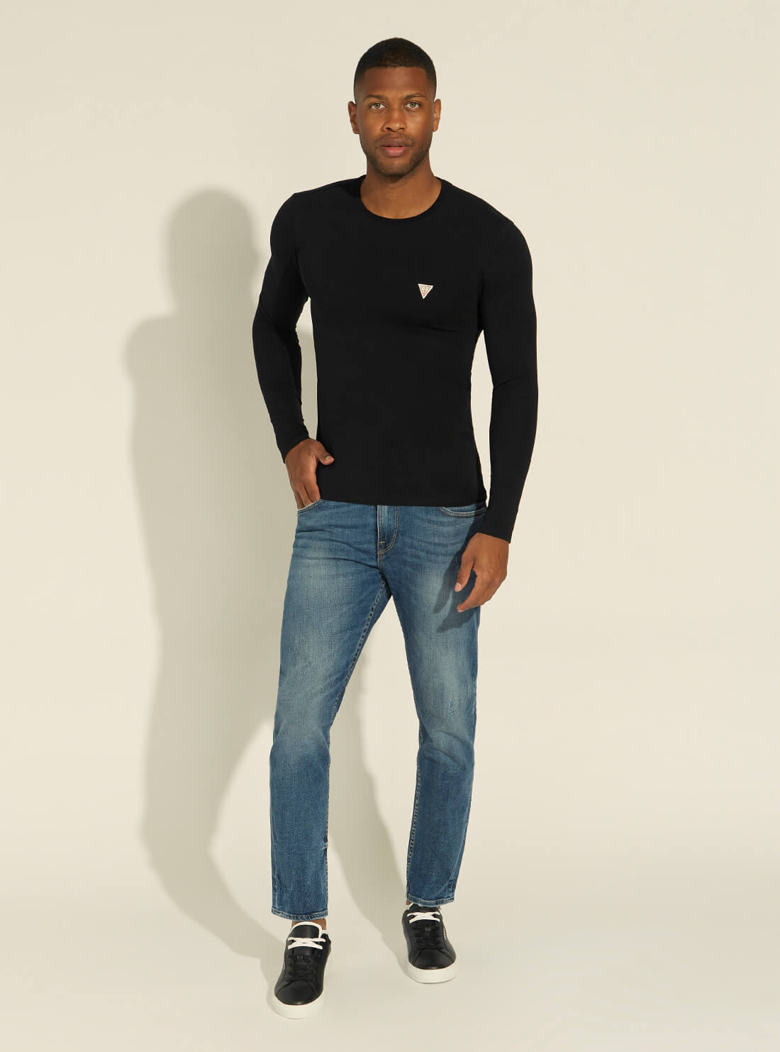GUESS Mens Mid-Rise Athletic Tapered Denim Jeans in Union Wash MBRAR53041B Full View