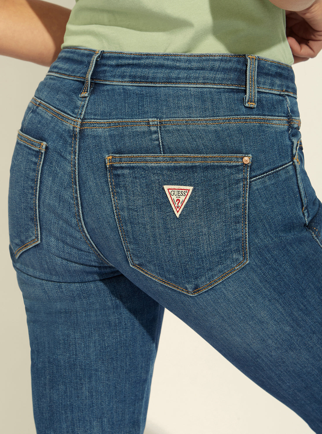 GUESS Womens Mid-Rise Skinny Curve Denim Jeans in Carry Mid Wash W1YAJ2D4GV2 Back Detail View