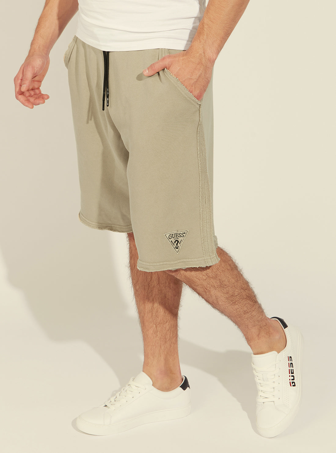GUESS Mens Beige Relaxed Patch Shorts M1GD55K68I1 Model Side View